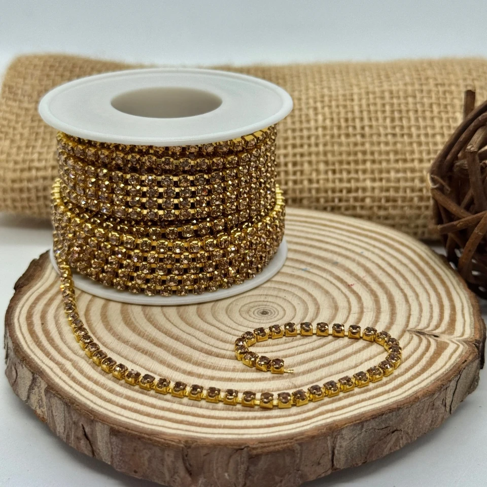 Цепі камні на бабінах ss 12 3 мм (10 ярдів), світло коричневий