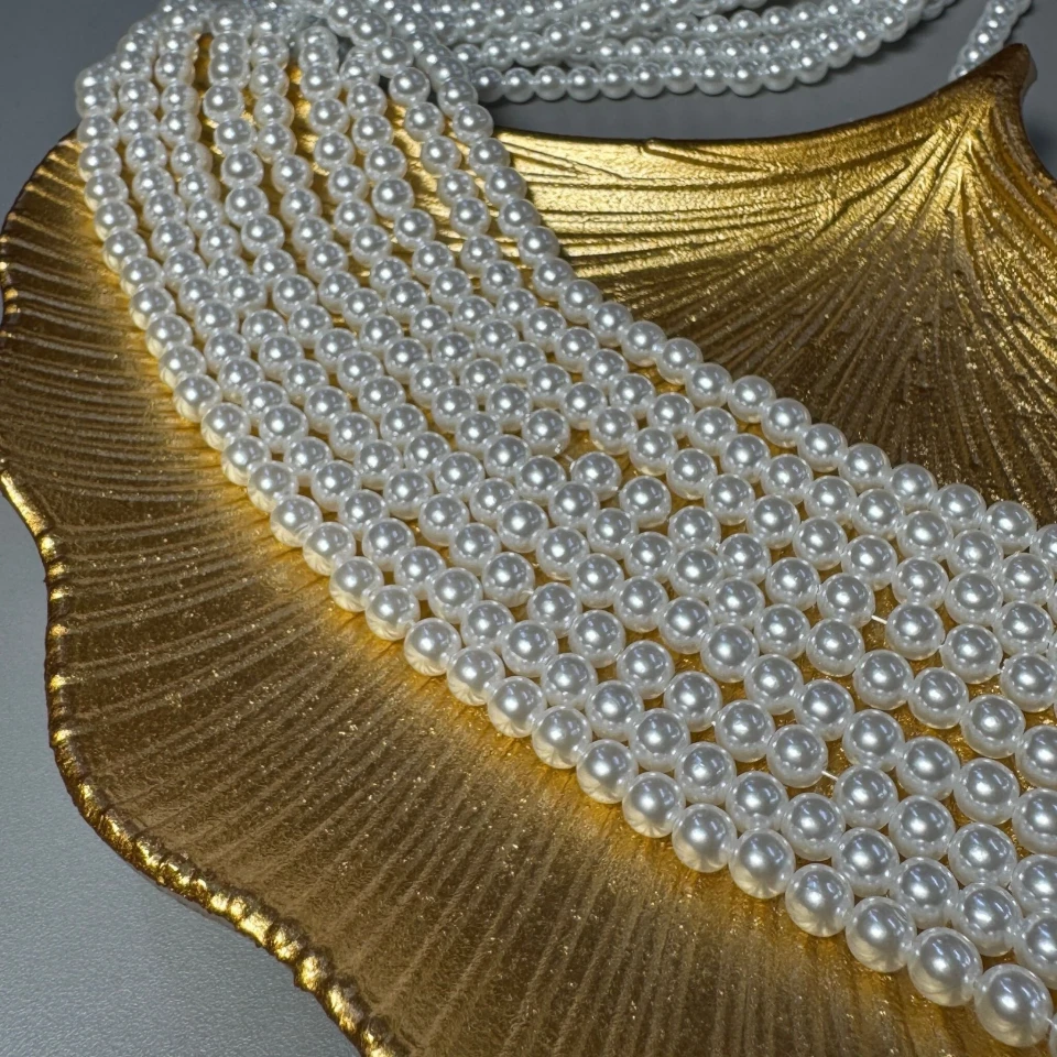 Перли на нитці 6 мм 1 кг, білий